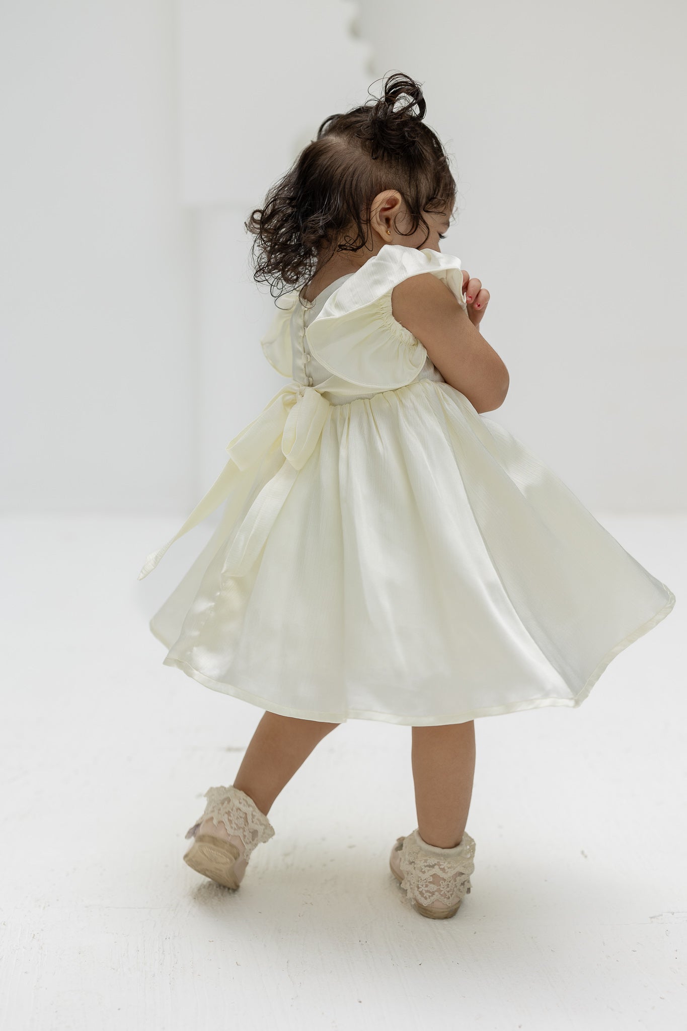 Ivory Blossom Baby Dress with Floral Embellishments